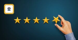 A hand laying down a fifth star in a five star review signifying how people feel about DraftKings and FanDuel sportsbooks